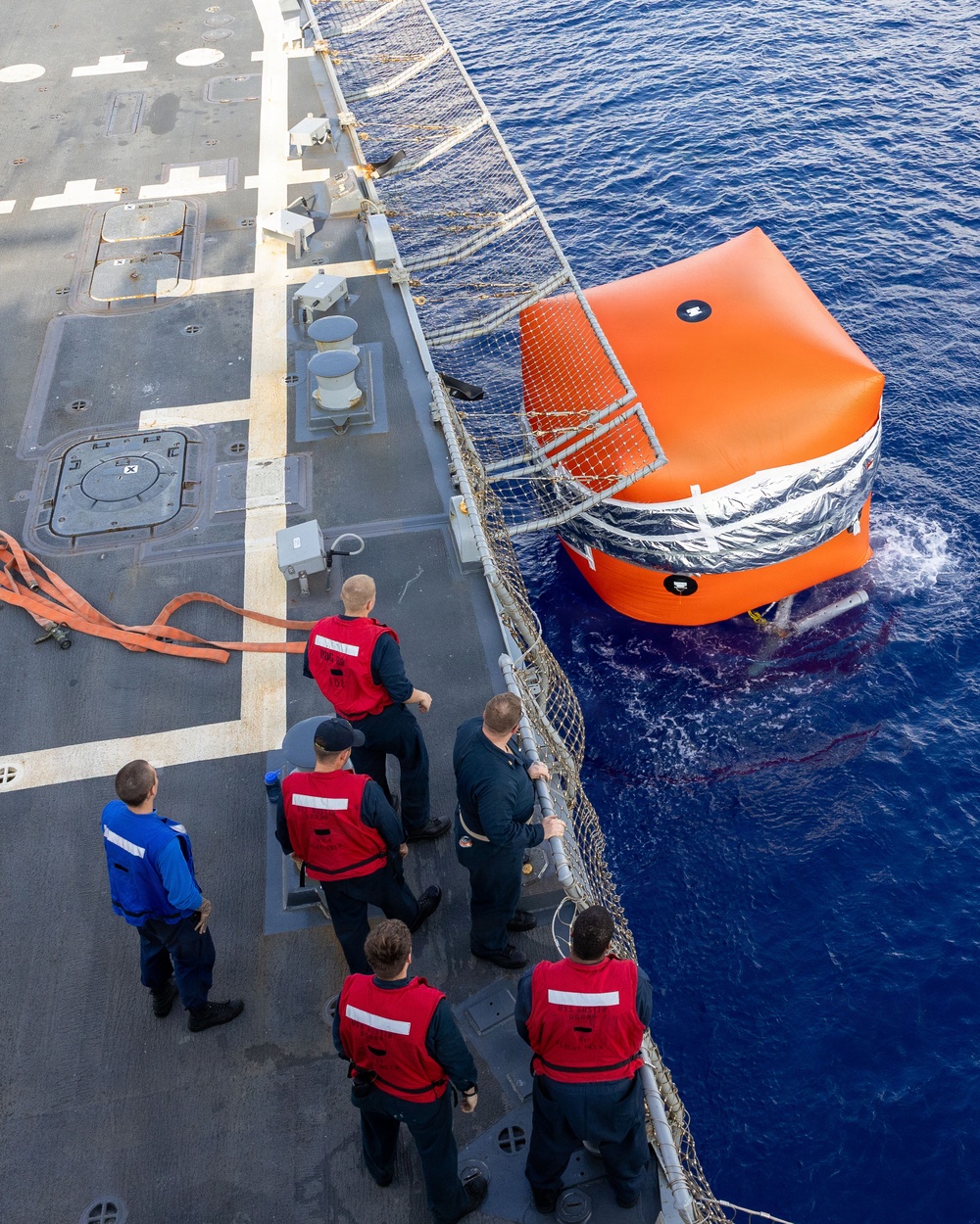 USS Mustin conducts a "killer tomato" inflatable surface target live-fire exercise