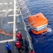 USS Mustin conducts a "killer tomato" inflatable surface target live-fire exercise