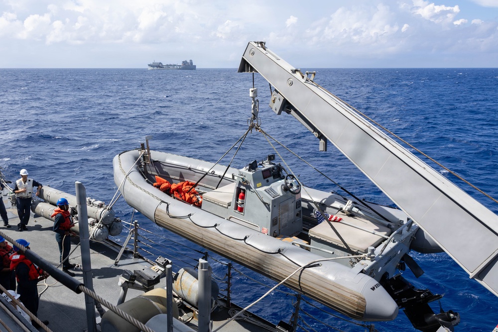USS Mustin conducts boat operations