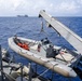 USS Mustin conducts boat operations