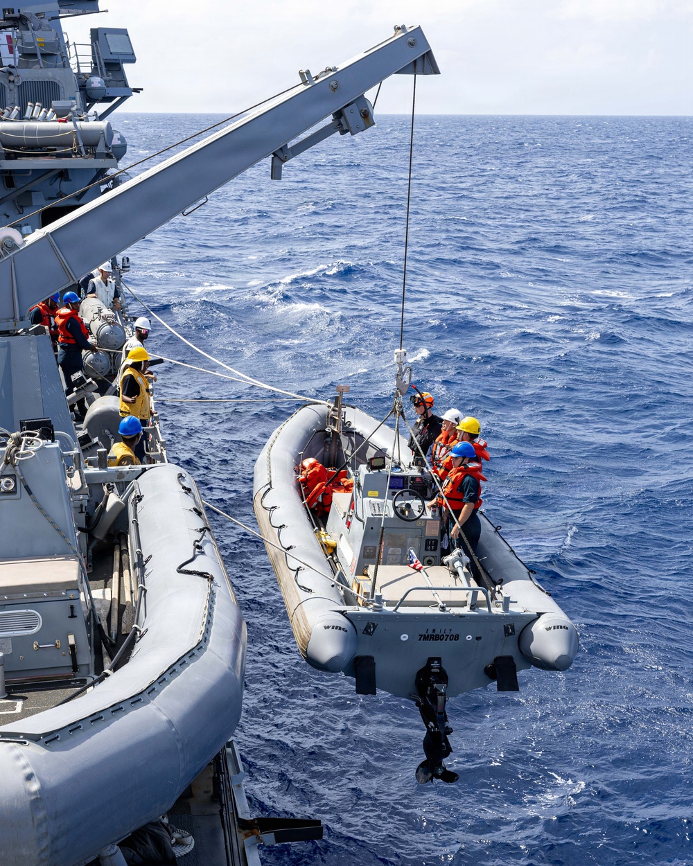 USS Mustin conducts boat operations