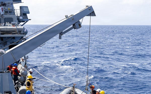 USS Mustin conducts boat operations