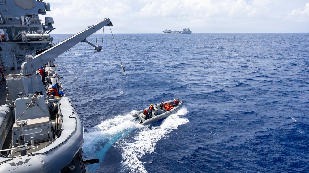 USS Mustin conducts boat operations