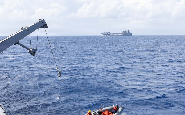 USS Mustin conducts boat operations