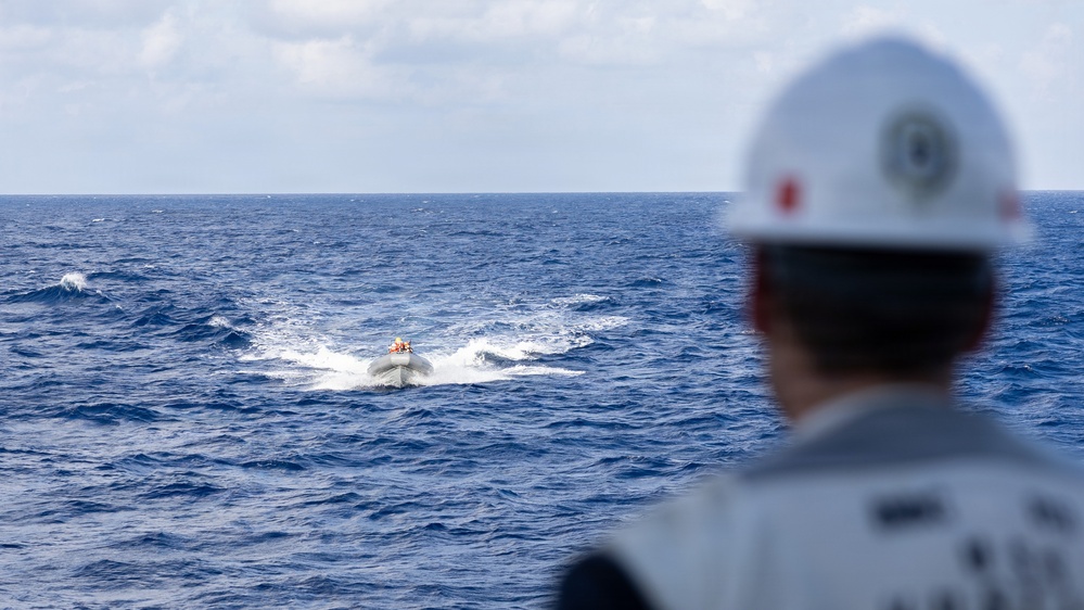 USS Mustin conducts boat operations