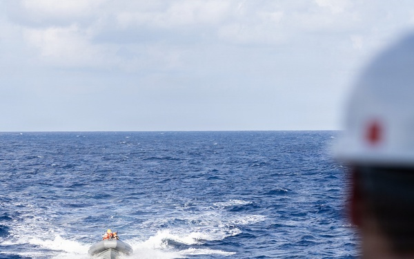 USS Mustin conducts boat operations