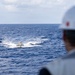 USS Mustin conducts boat operations