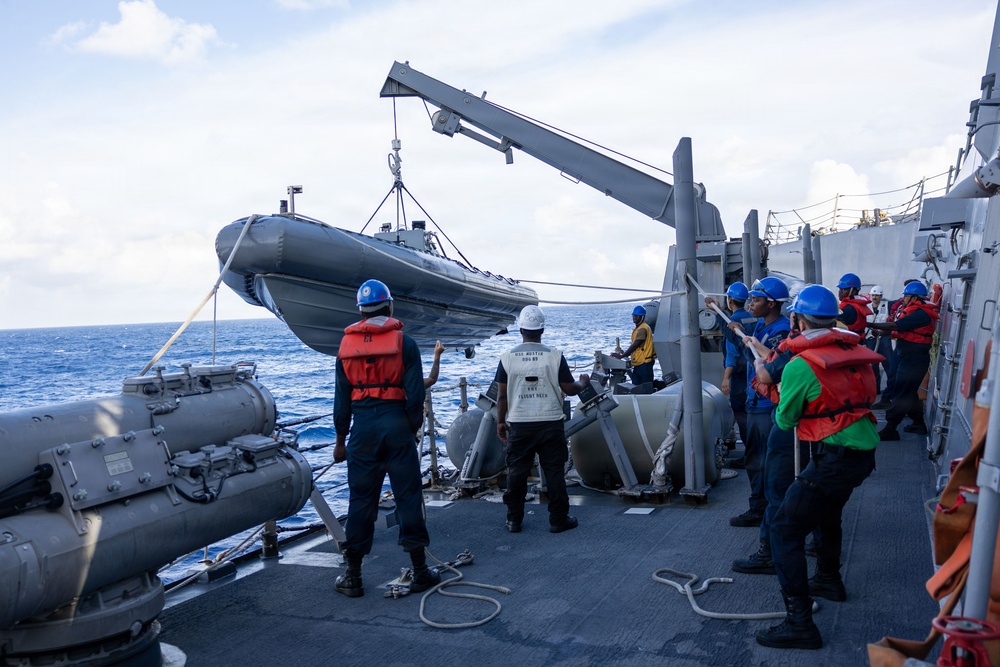 USS Mustin conducts boat operations