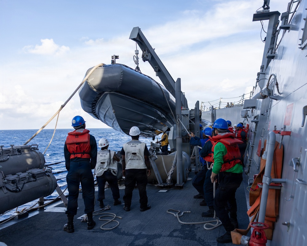 USS Mustin conducts boat operations