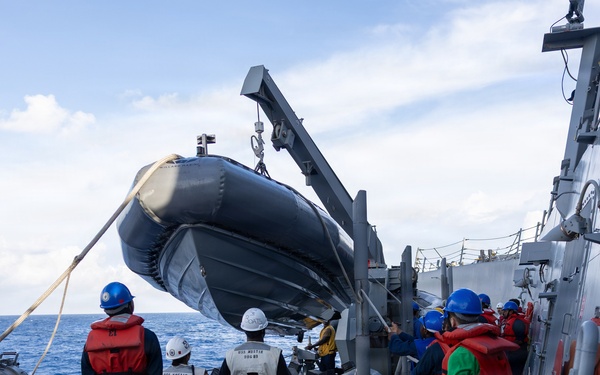 USS Mustin conducts boat operations