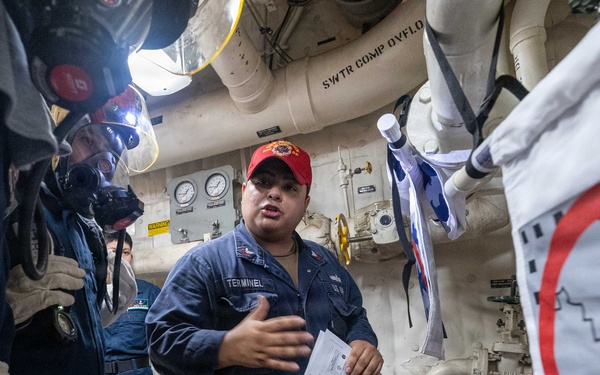 USS Mustin conducts a general quarters drill