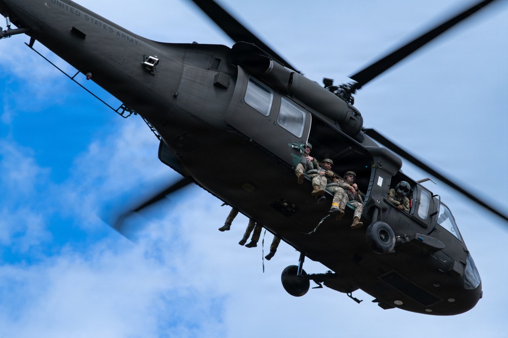 Joint Airborne Operations: DLA Distribution riggers join 148th ASOS to conduct static line jump