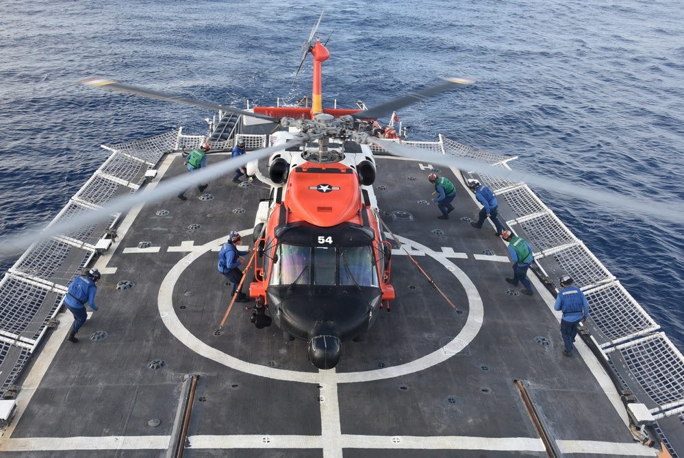 Coast Guard Cutter Thetis crew members support MH-60 Jayhawk helicopter operations