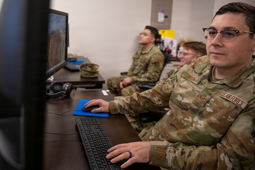 Intel Airmen Behind the Screen, Ahead of the Threat