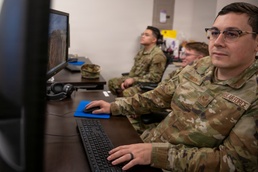 Intel Airmen Behind the Screen, Ahead of the Threat