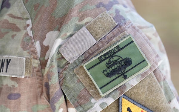 Above the Iron: 1AD Debuts "Superior" and "Distinguished" Gunnery Patch