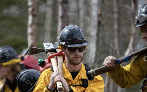 Alaska Air National Guard, Air Force, and State of Alaska Division of Forestry and Fire Protection firefighters team up during controlled burns
