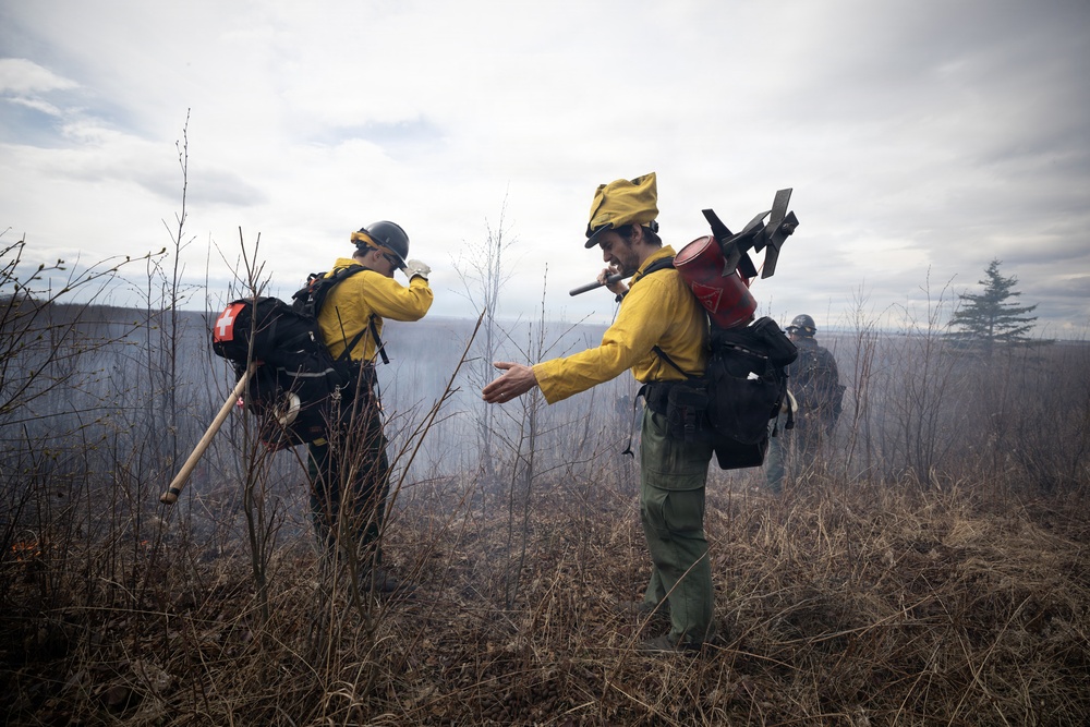 Alaska Air National Guard, Air Force, and State of Alaska Division of Forestry and Fire Protection firefighters team up during controlled burns