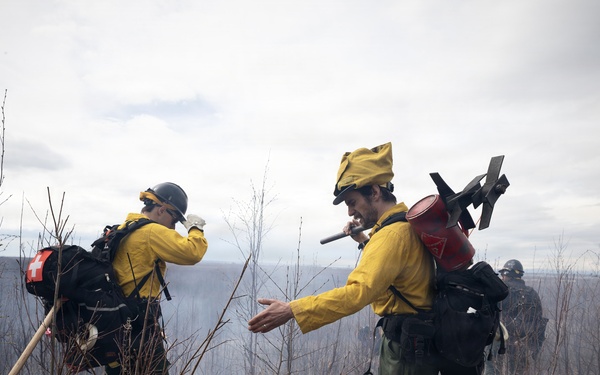 Alaska Air National Guard, Air Force, and State of Alaska Division of Forestry and Fire Protection firefighters team up during controlled burns
