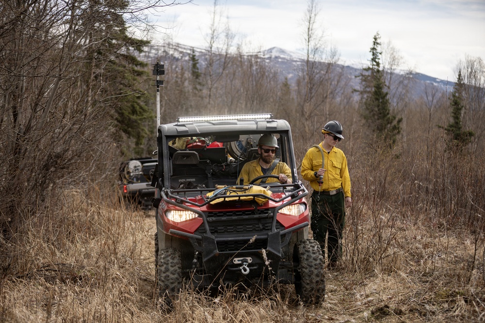 Alaska Air National Guard, Air Force, and State of Alaska Division of Forestry and Fire Protection firefighters team up during controlled burns