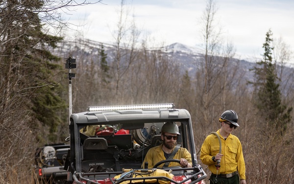 Alaska Air National Guard, Air Force, and State of Alaska Division of Forestry and Fire Protection firefighters team up during controlled burns