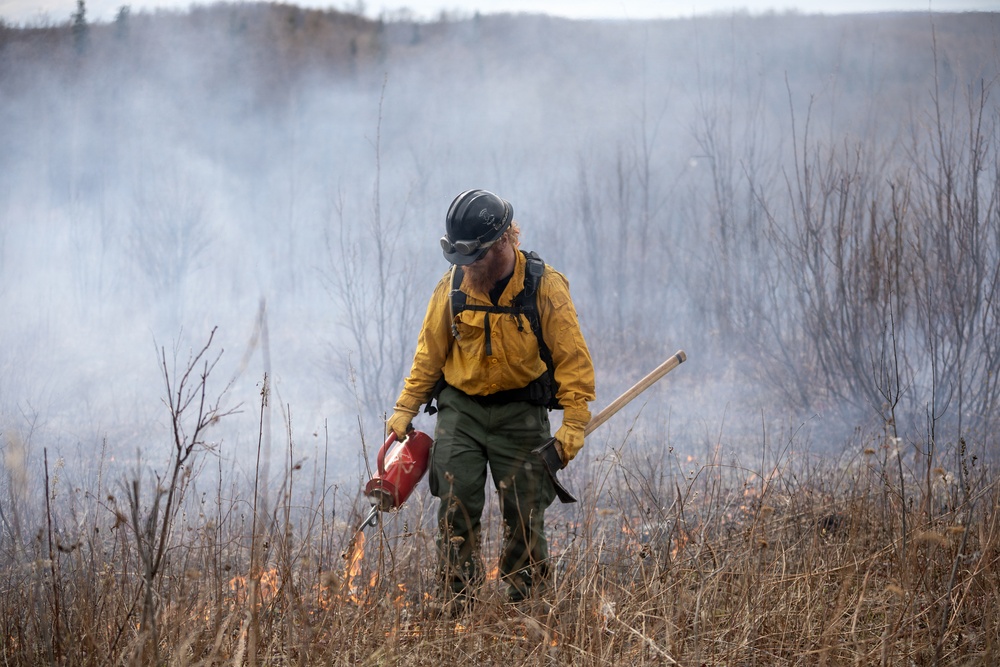Alaska Air National Guard, Air Force, and State of Alaska Division of Forestry and Fire Protection firefighters team up during controlled burns