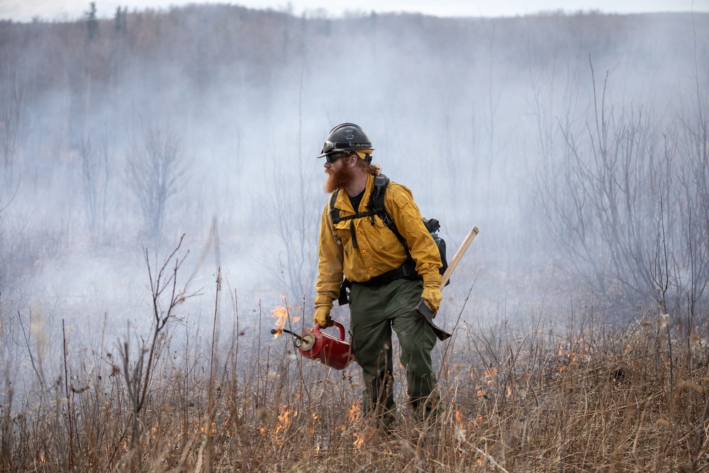 Alaska Air National Guard, Air Force, and State of Alaska Division of Forestry and Fire Protection firefighters team up during controlled burns