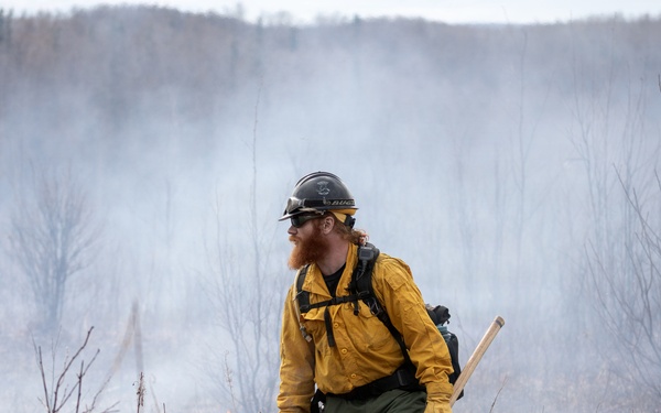 Alaska Air National Guard, Air Force, and State of Alaska Division of Forestry and Fire Protection firefighters team up during controlled burns