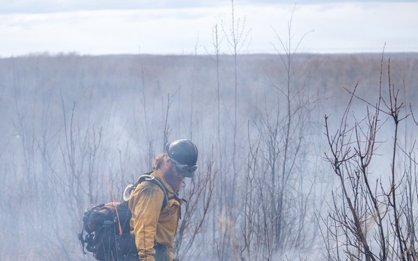 Alaska Air National Guard, Air Force, and State of Alaska Division of Forestry and Fire Protection firefighters team up during controlled burns