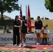 DoWEA Chief Academic Officer Tiffany Hoben presents Presidential Physical Fitness Awards to students