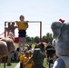 DoWEA Crossroads Elementary School student performs pull-ups during the Presidential Physical Fitness Test
