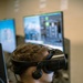 Student Naval Aviator Trains Using Virtual Reality Simulator