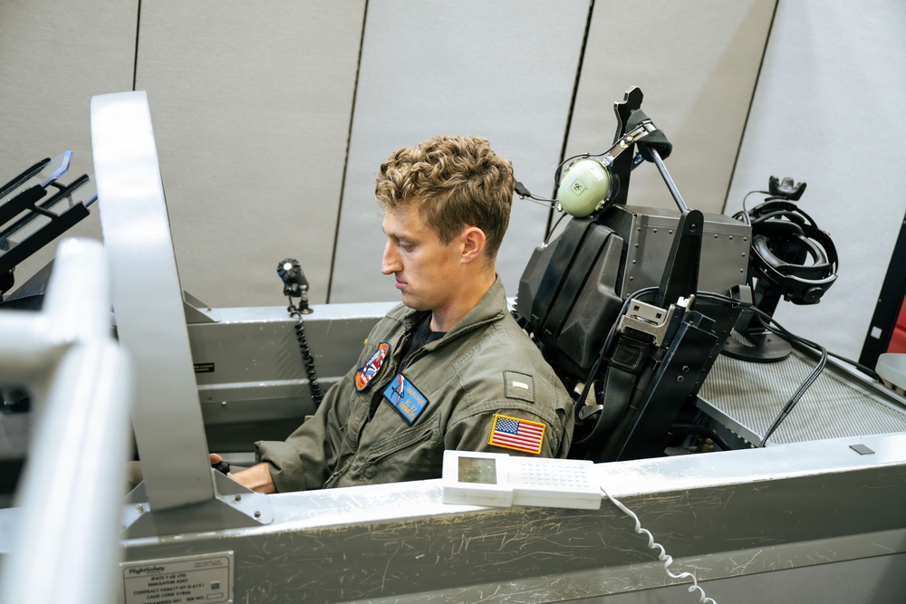Student Naval Aviator Practices Flight Procedures with Static Virtual Reality Trainer