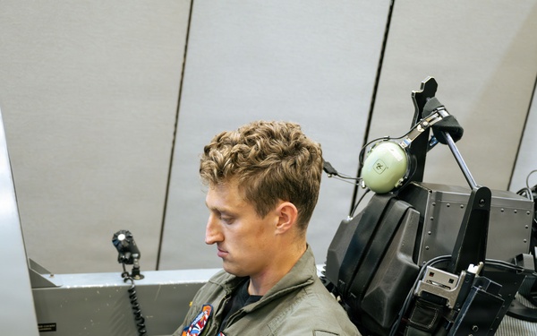 Student Naval Aviator Practices Flight Procedures with Static Virtual Reality Trainer