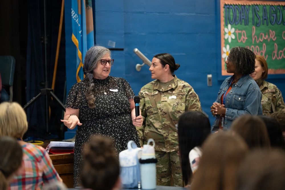 Legal Office Airmen award students during Law Day