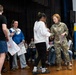 Legal Office Airmen award students during Law Day