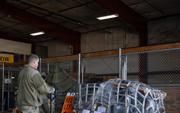 Aerial Port Loading All-Terrain Forklift on AC-130J Ghostrider