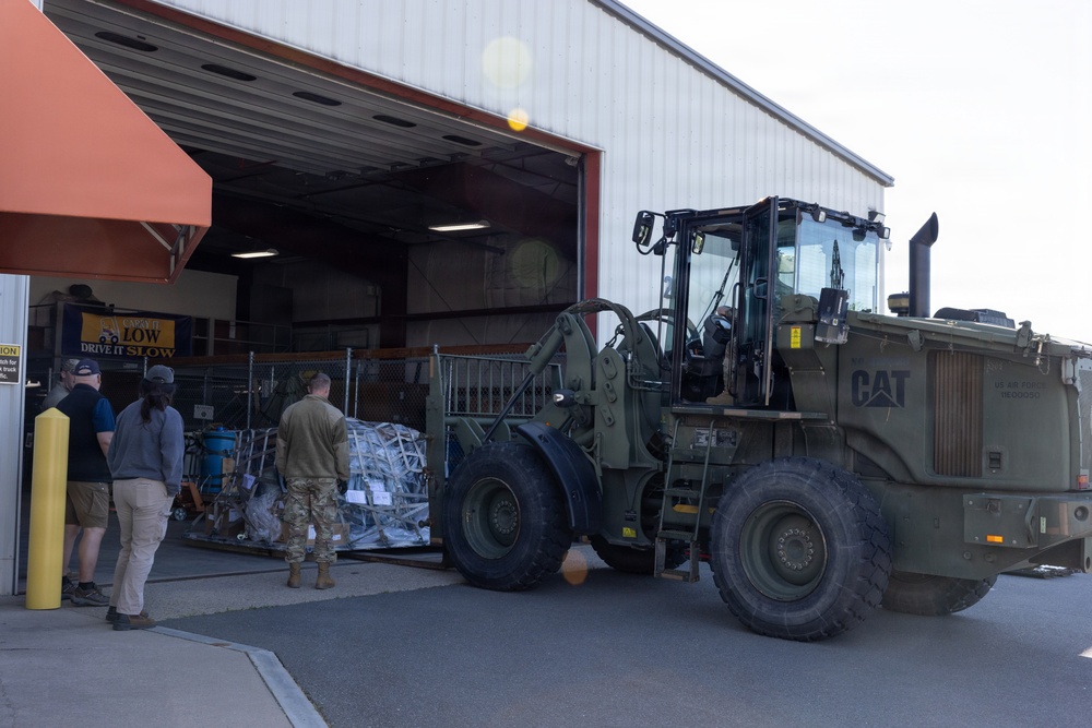Aerial Port Loading All-Terrain Forklift on C-130J Super Hercules