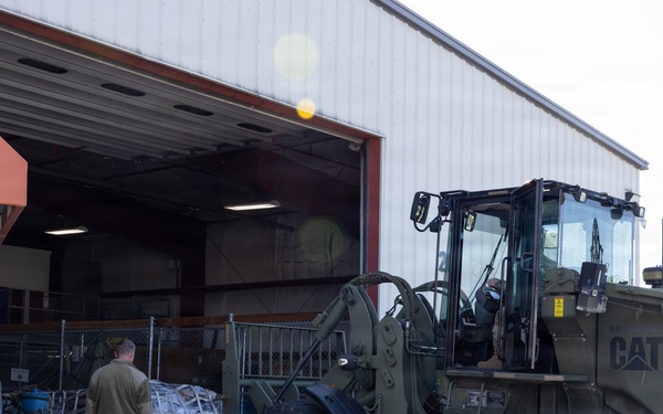 Aerial Port Loading All-Terrain Forklift on C-130J Super Hercules