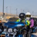 Marine and civilian personnel waved on veteran motorcycle riders with salutes and American flags along Route 66/Joseph L. Boll