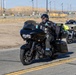 Marine and civilian personnel waved on veteran motorcycle riders with salutes and American flags along Route 66/Joseph L. Boll