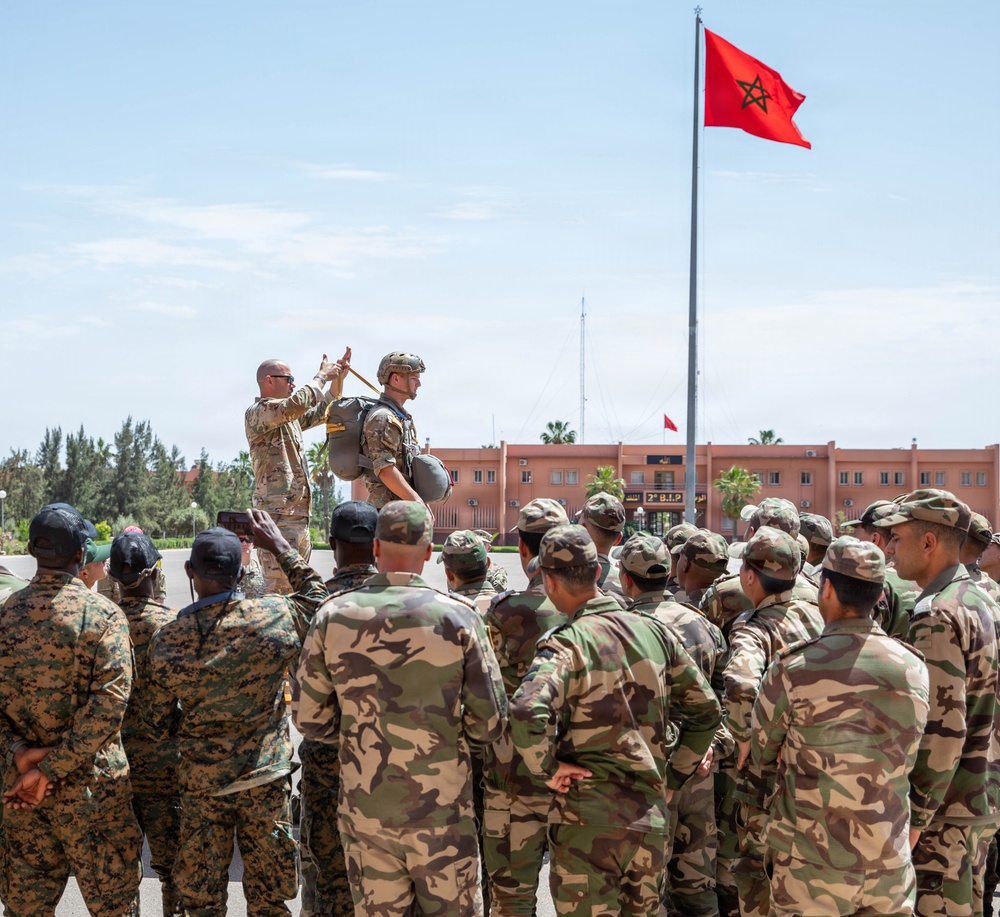 Special forces service members execute airborne operations in austere conditions during African Lion 26