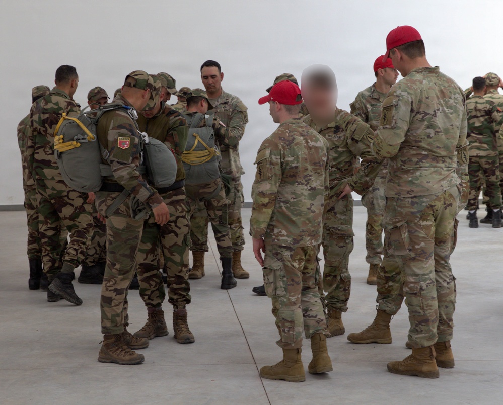 Special forces service members execute airborne operations in austere conditions during African Lion 26