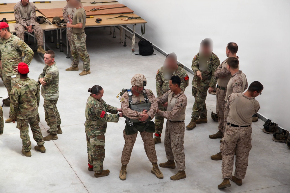 Special forces service members execute airborne operations in austere conditions during African Lion 26