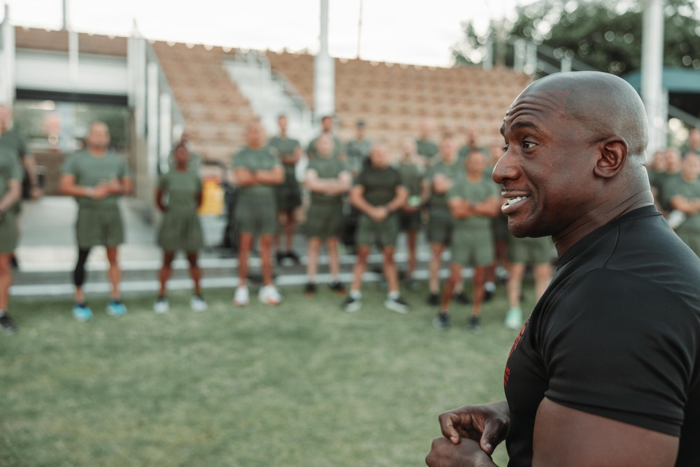Sgt. Maj. Carlos A. Ruiz conducts physical training aboard MCAGCC