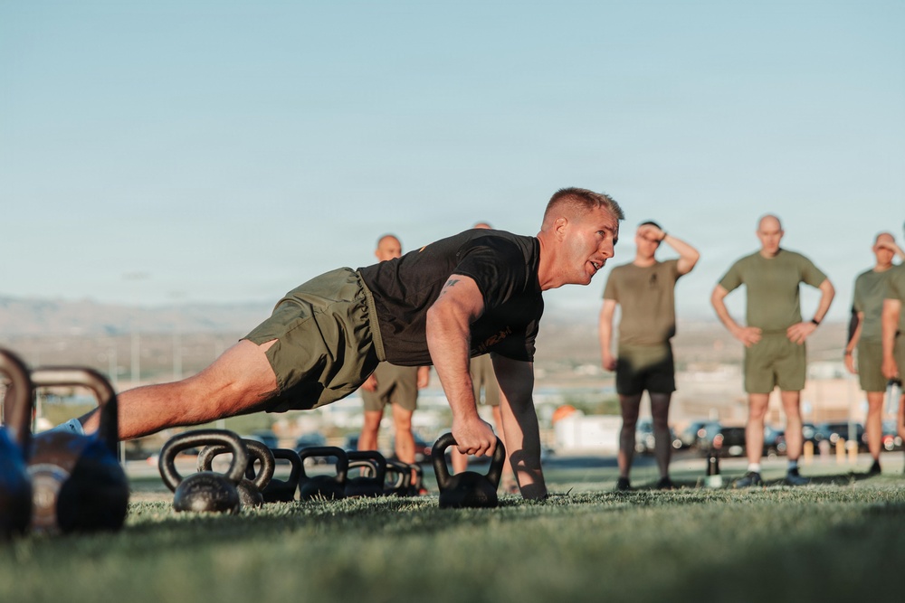 Sgt. Maj. Carlos A. Ruiz conducts physical training aboard MCAGCC