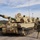 Best Redleg Competitors from 1st Armored Division Artillery load up ammunition in preparation for their evaluated live fire