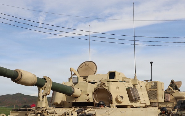 Best Redleg Competitors from 1st Armored Division Artillery load up ammunition in preparation for their evaluated live fire