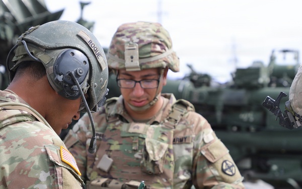 Best Redleg Competitors from 1st Armored Division Artillery load up ammunition in preparation for their evaluated live fire