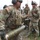 Best Redleg Competitors from 1st Armored Division Artillery load up ammunition in preparation for their evaluated live fire